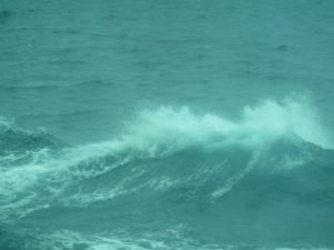 Waves of the North Atlantic outside cabin window.